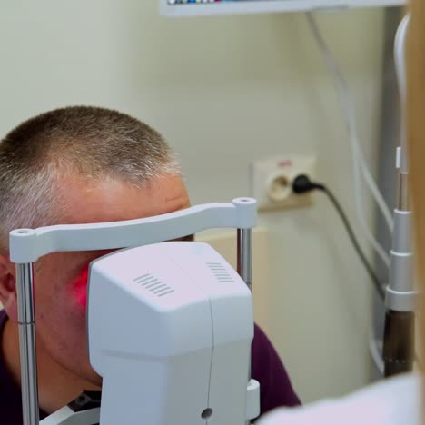 man checking the eye vision
