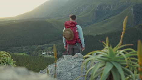 Man,-celebration-and-mountain-with-hiking