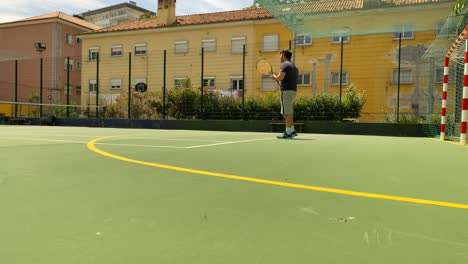 Wide-view-of-one-professional-tennis-player-waiting-for-the-competition,-Portugal,-Lisbon