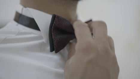 straighten-the-butterfly-neod-tie-of-the-wedding-suit---SLOW-MOTION