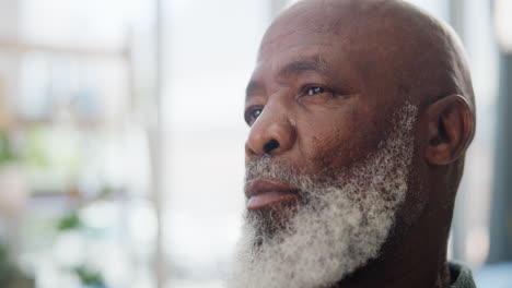 close-up portrait of a thoughtful senior man