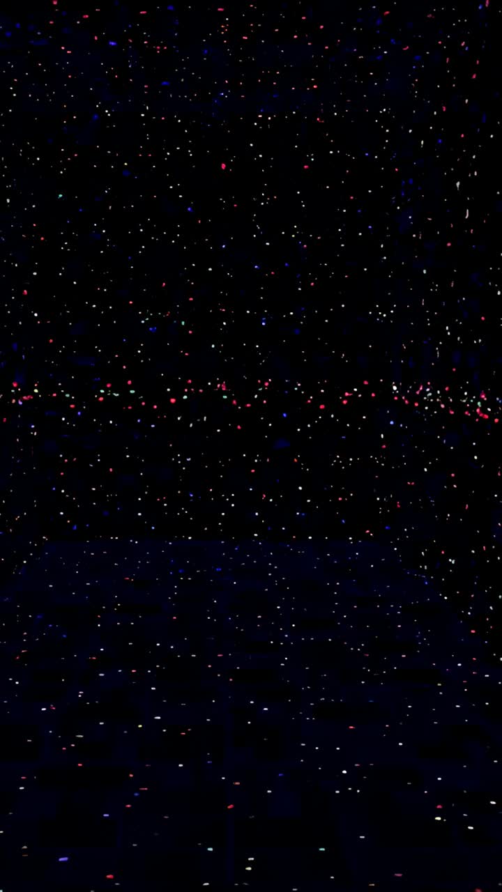 Vertical video: Filming string of colored lights twinkling at night over dark horizon, starry sky