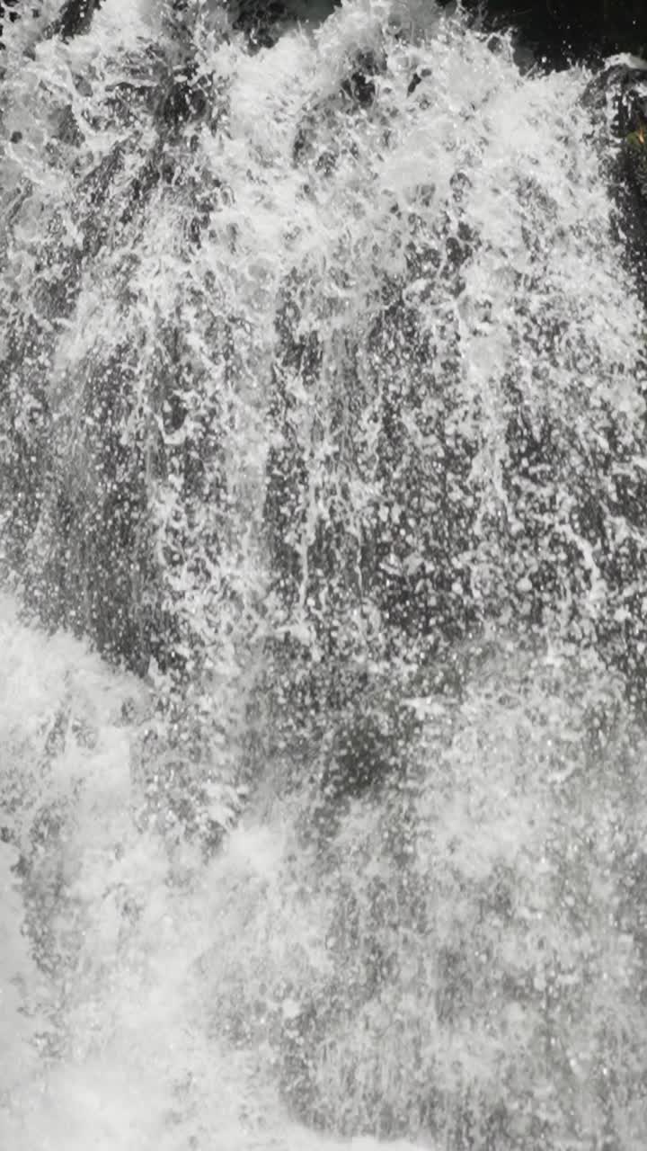 VERTICAL SLOW MOTION OF A WATERFALL IN URUAPAN