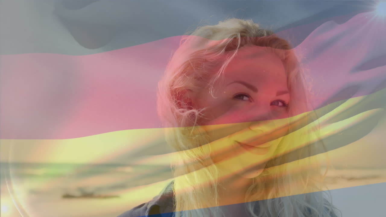 animación de la bandera de alemania ondeando sobre vista aérea de las olas en el mar
