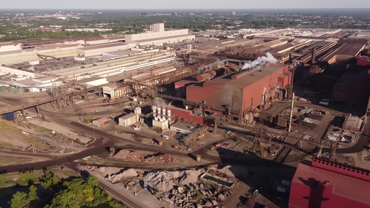Ford Motor Company And AK Steel Caster At The Industrial Area By Rouge River In Detroit, Michigan - aerial panning shot