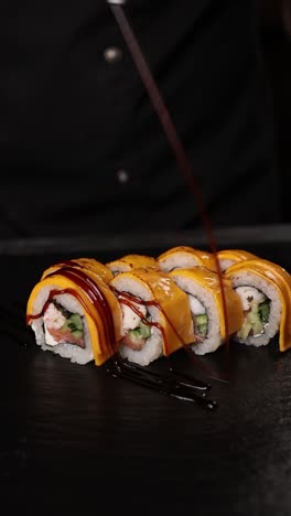 chef preparing a delicious sushi roll