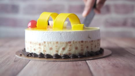 cutting a delicious birthday cake