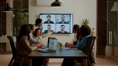business team engages in video conference meeting