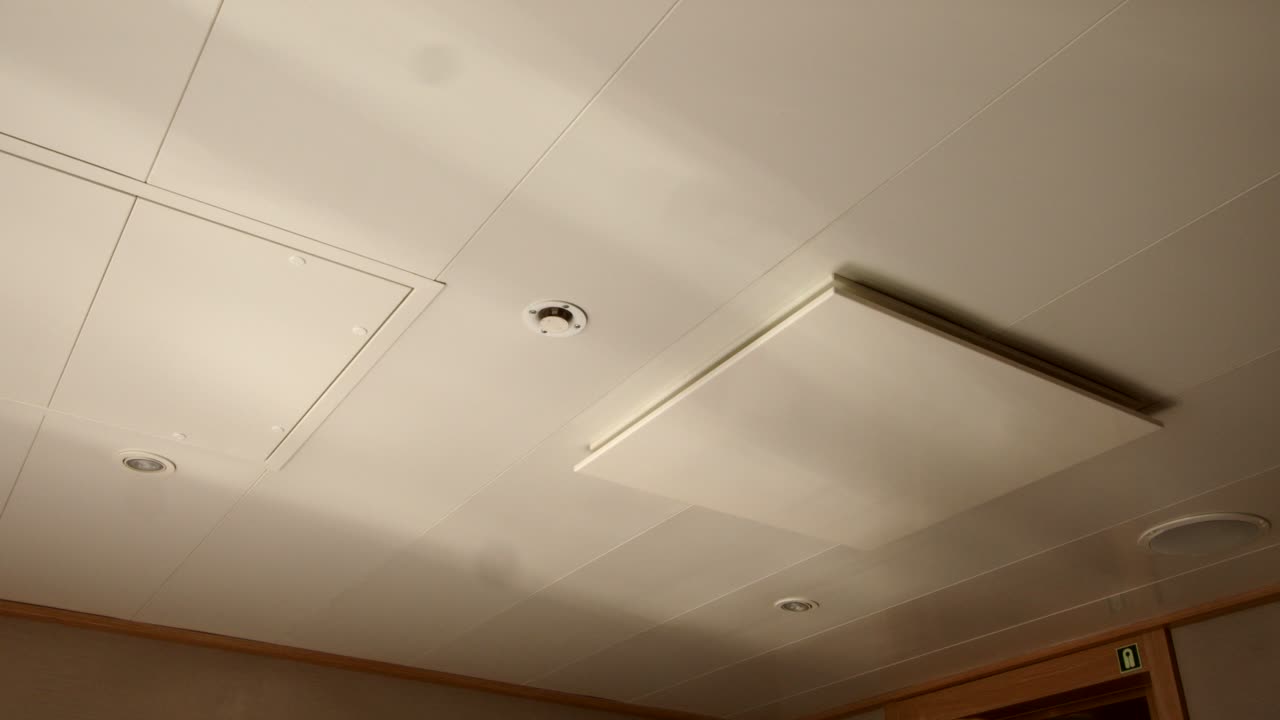 Sea reflecting light on a cruise ship cabin ceiling