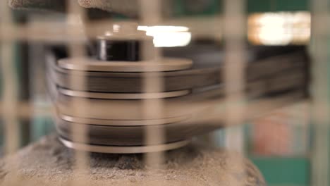 belt and pulley of stone mill at work in wheat factory