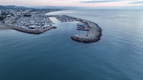 Drone-shot-flying-over-the-Mediterranean-Sea-on-the-coast-of-Catalonia,-Spain