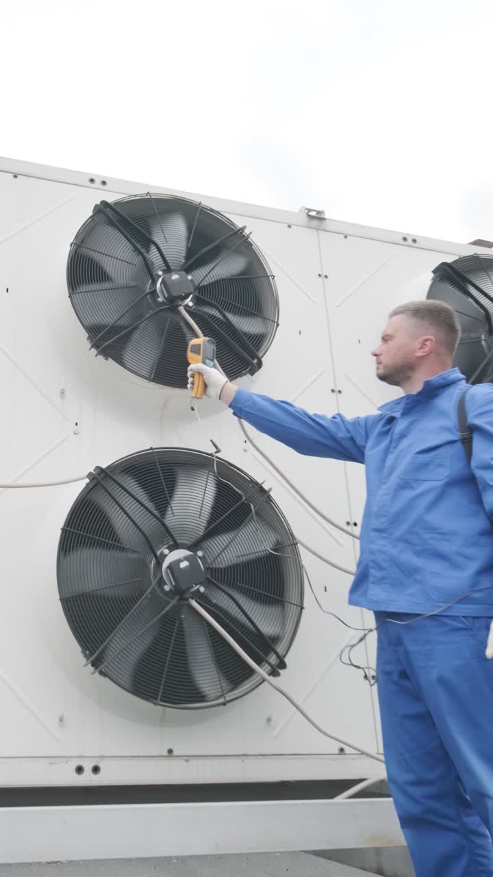 LA Heating & Air Pros technician servicing an HVAC system on site