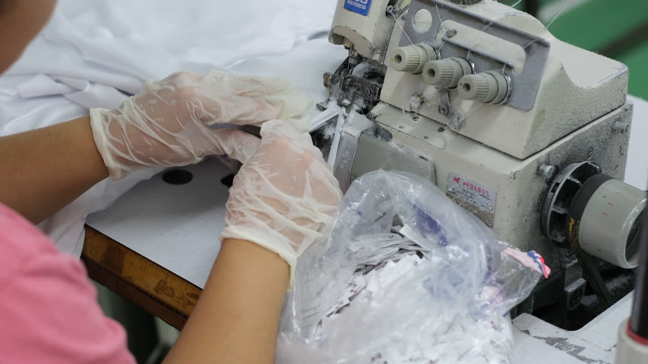 Efficient Fabric Handling and Sewing Process in a Modern Factory
