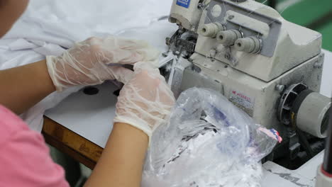 efficient fabric handling and sewing process in a modern factory