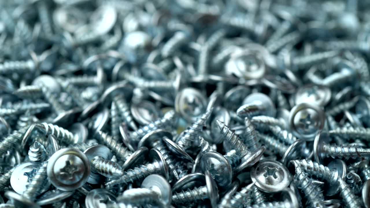 muchos tornillos de auto-tapeo rotan el fondo de movimiento