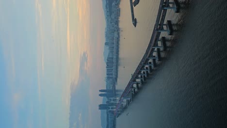 vertical - gwangan bridge or diamond bridge at dusk blue hour sunset in busan, south korea - static shot