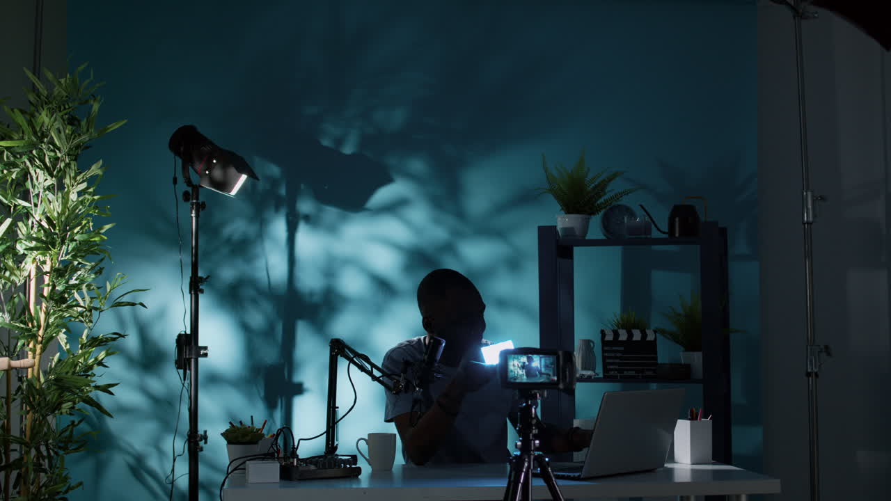 Man showing product on camera and filming vlog