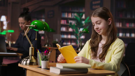 girl reading in library