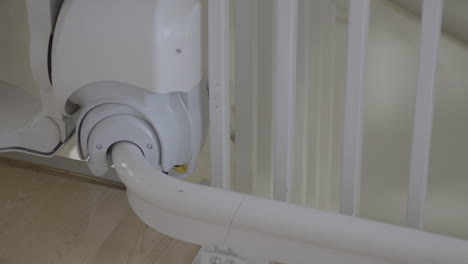 close up of a child with a disability moving on on a stairlift