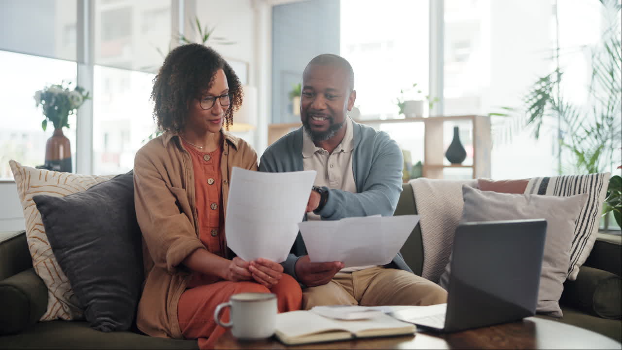 Couple Reviewing Financial Documents