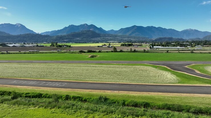 Airport Road Of Chilliwack Municipal Airport In British Columbia, Canada - aerial drone shot