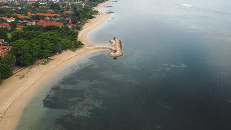 Beautiful-cinematic-Sanur-beach,-Bali-drone-footage-with-interesting-landscape,-fishing-boats-and-calm-weather