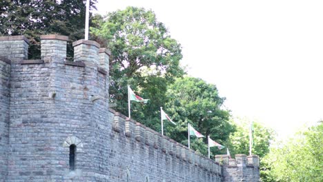 cardiff castle with flags waving in breeze