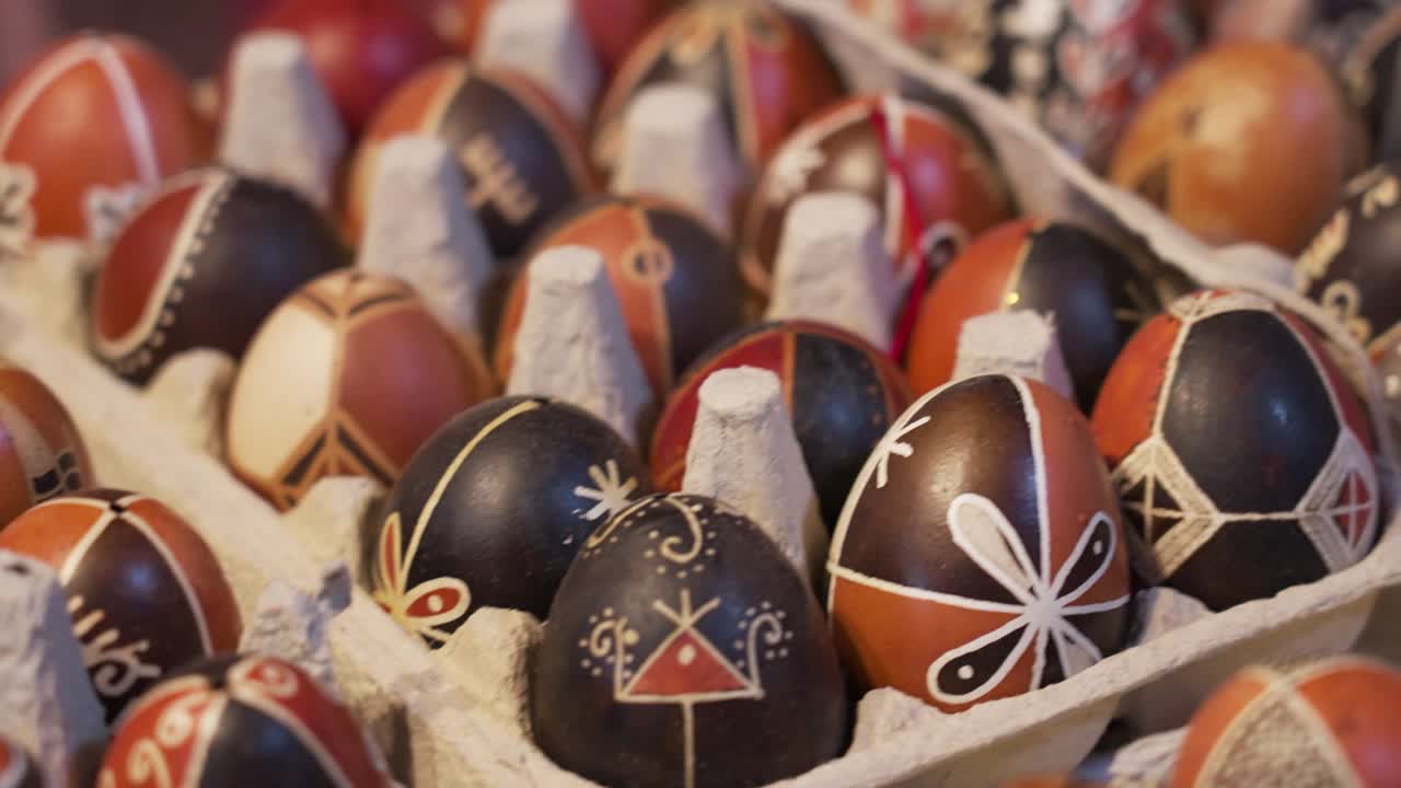 Close-up view of hand-decorated traditional Easter eggs in Hungarian folk style