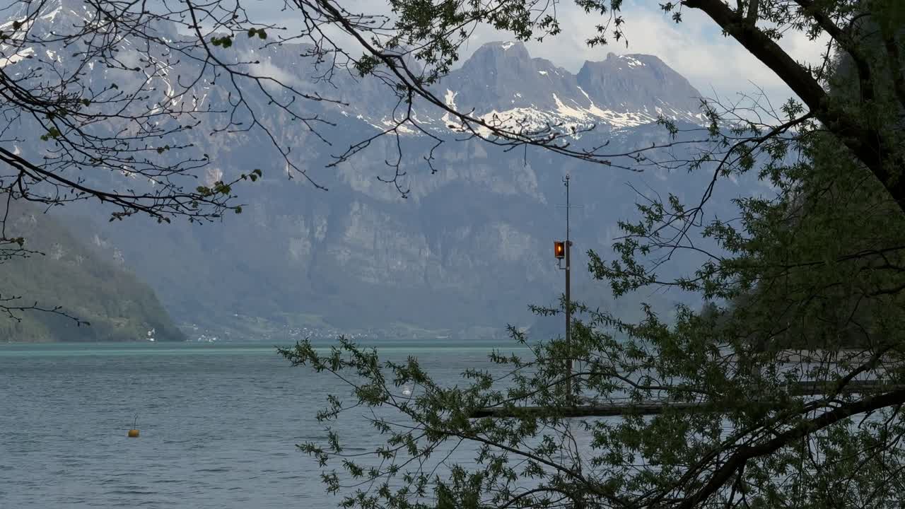 Switzerland nature highlands Swiss Alps mountains peak snow covered Walensee lake valley