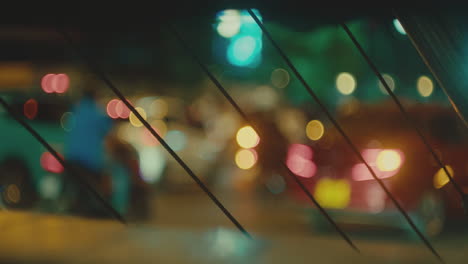 cars and motorcycles on the night street road during rush hour