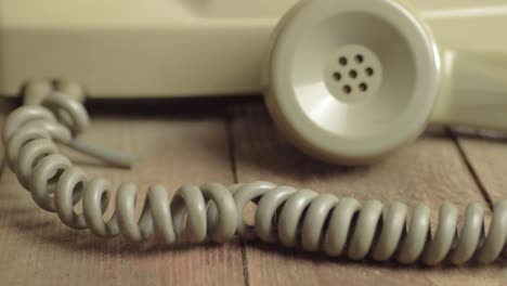 green vintage retro phone close up of coil and receiver