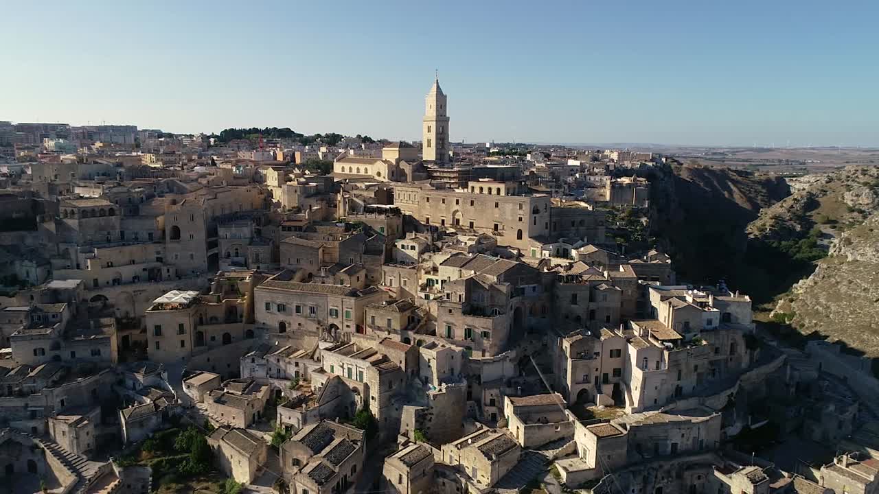 the ancient village of Matera recorded with drone very close. The small town is located on a hill, the sassi and rupestrian churches were named world heritage site.