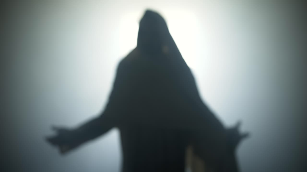 Silhouette of resurrection of Jesus Christ inside the tomb, in bright light, raising his hands in dramatic, cinematic slow motion. Perfect for Easter resurrection visual.