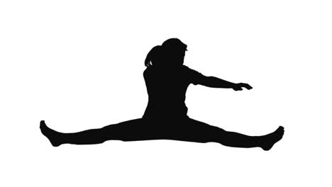 silhouette of woman stretching her legs