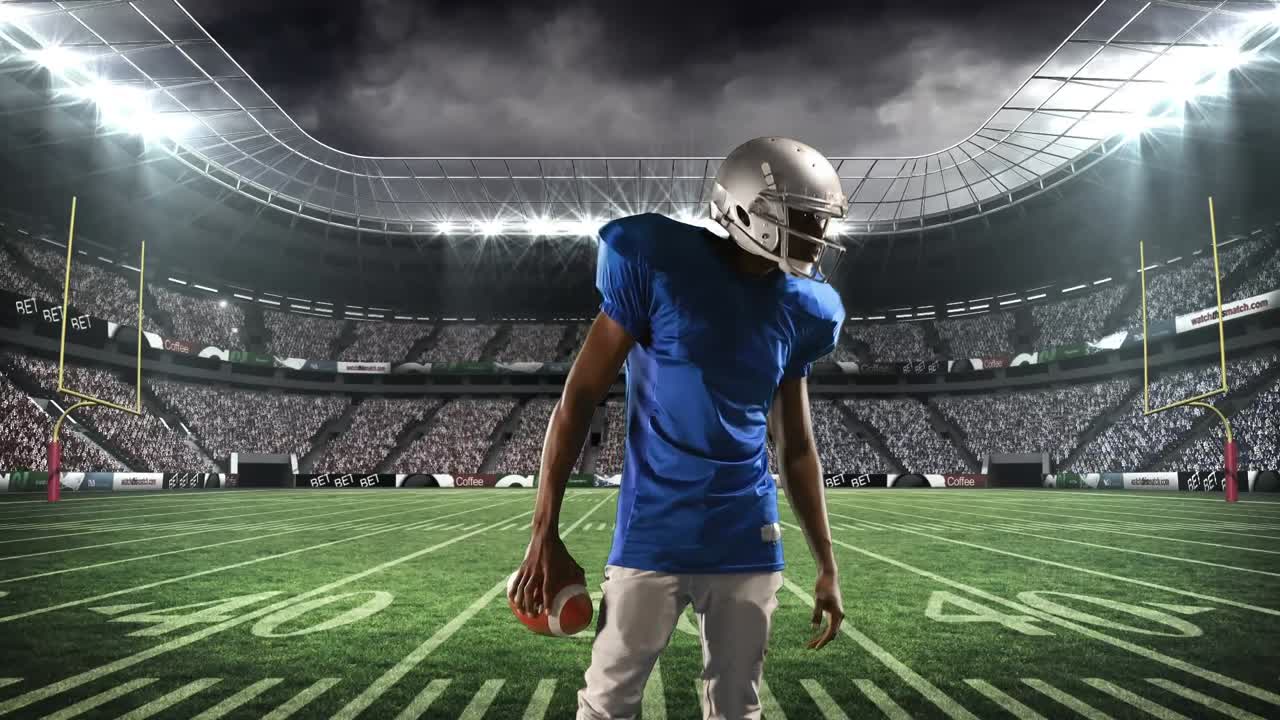 Giocatore di football che si riscalda per una partita allo stadio