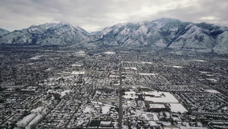 slc backward reveal wasatch range utah mid winter cold snowy fog cloudy high city scape march 2019