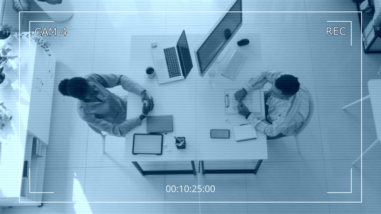 CCTV of Colleagues Giving Handshake when Meeting at Office