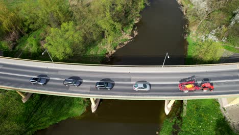 drone shot, slow camera movement upwards, łęczna, poland, old bridge, nature, river