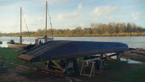 wooden vessel undergoing major refit and repair