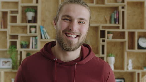 close up of attractive cheerful caucasian man laughing cheerful feeling happy enjoying lifestyle