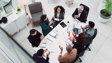 diverse business team celebrating success in a meeting