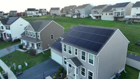 house with solar panels in beautiful rich neighborhood in usa
