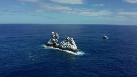 roca partida split rock island of revillagigedo in mexico, aerial establishing orbit