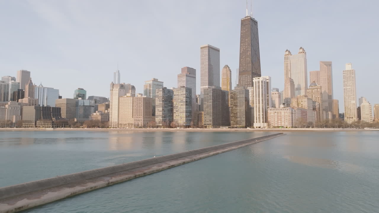Aerial view of Chicago and Lake Michigan at sunrise.
