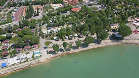 Aerial-Shot-of-Camping-Cisano-San-Vito-Beside-Lake-Garda,-Italy