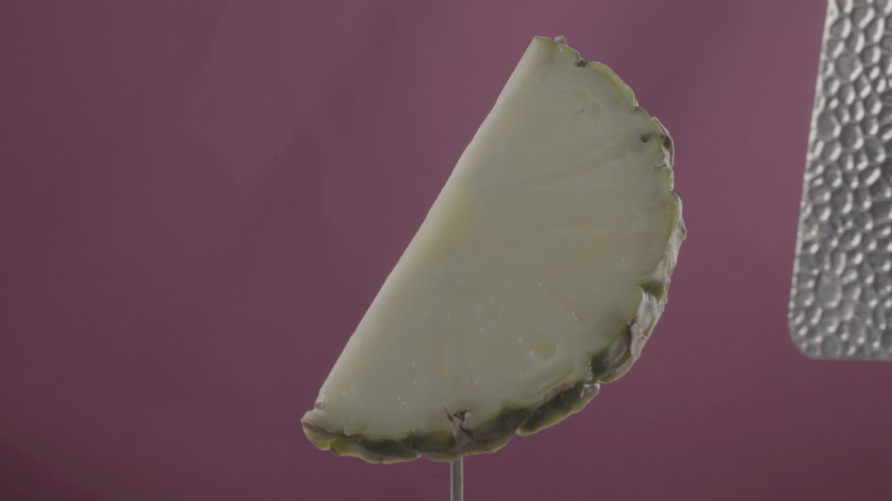 piña girando con bucle en la pantalla de fucsia para la llave de croma