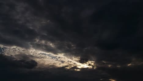 dramatic dark clouds and rays of light