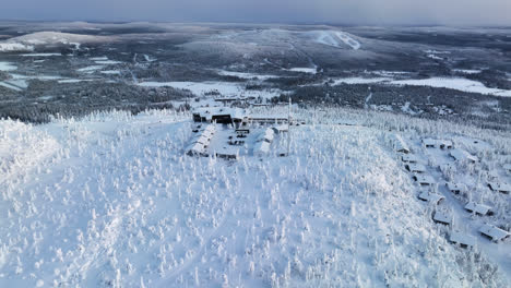 hyperlapse drone shot overlooking the top of iso-syote fell, winter in finland