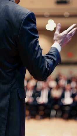 speaker at a conference or business meeting