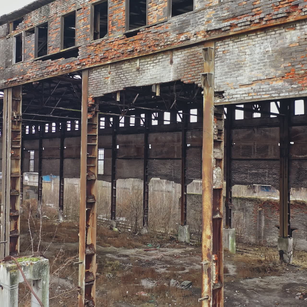 Abandoned ruined industrial factory building, ruins and demolition concept. Aerial view